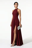 Red sleeveless maxi dress for women by FJØRNA featuring a high neck, A-line silhouette, and side slit.