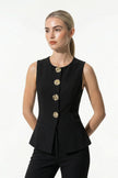 Black women's sleeveless waistcoat by FJØRNA with metal buttons, perfect for layered stylish outfits.
