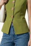 Olive green women's sleeveless waistcoat with metal buttons, tailored fit, from FJØRNA, ideal for layering and stylish outfits.