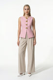 Pink women's sleeveless waistcoat with metal buttons, tailored fit, perfect for layering, by FJØRNA.