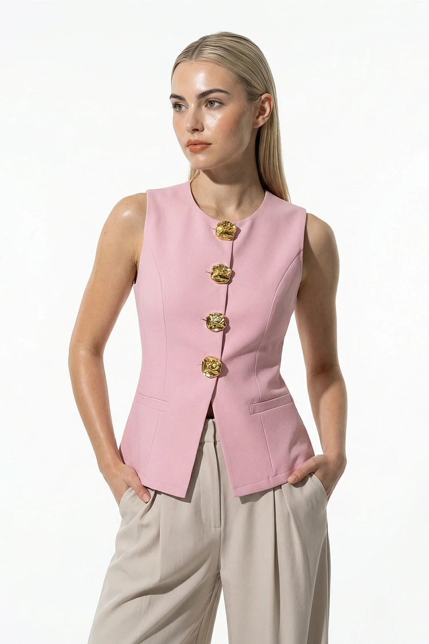 Pink women's sleeveless waistcoat by FJØRNA with tailored fit and metal buttons, perfect for layering and stylish outfits.