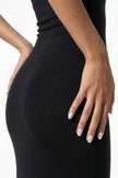 Close-up of FJØRNA black sleeveless bodycon maxi dress for women, highlighting the fitted fabric and sleek summer design.