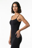 Black FJØRNA sleeveless bodycon maxi dress for women, showcasing a fitted summer business dress with a sleek silhouette.