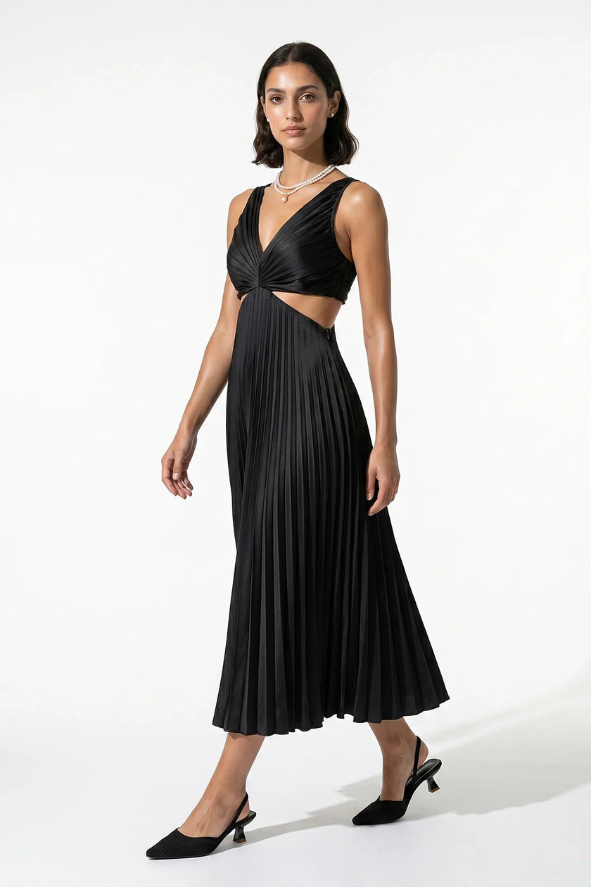 FJØRNA black pleated V-neck maxi dress with cut-out waist, suspender style, full-body view for occasion wear