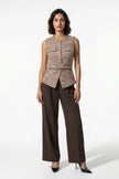 Orange women's tailored belted waistcoat by FJØRNA, slim-fit round-neck design, full-body view showing stylish modern silhouette.