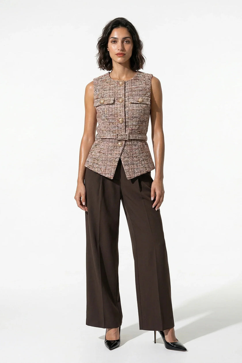 Orange women's tailored belted waistcoat by FJØRNA, slim-fit round-neck design, full-body view showing stylish modern silhouette.