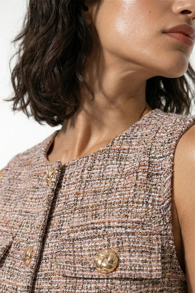 Orange women's tailored belted waistcoat by FJØRNA, slim-fit design with round neck and stylish details.