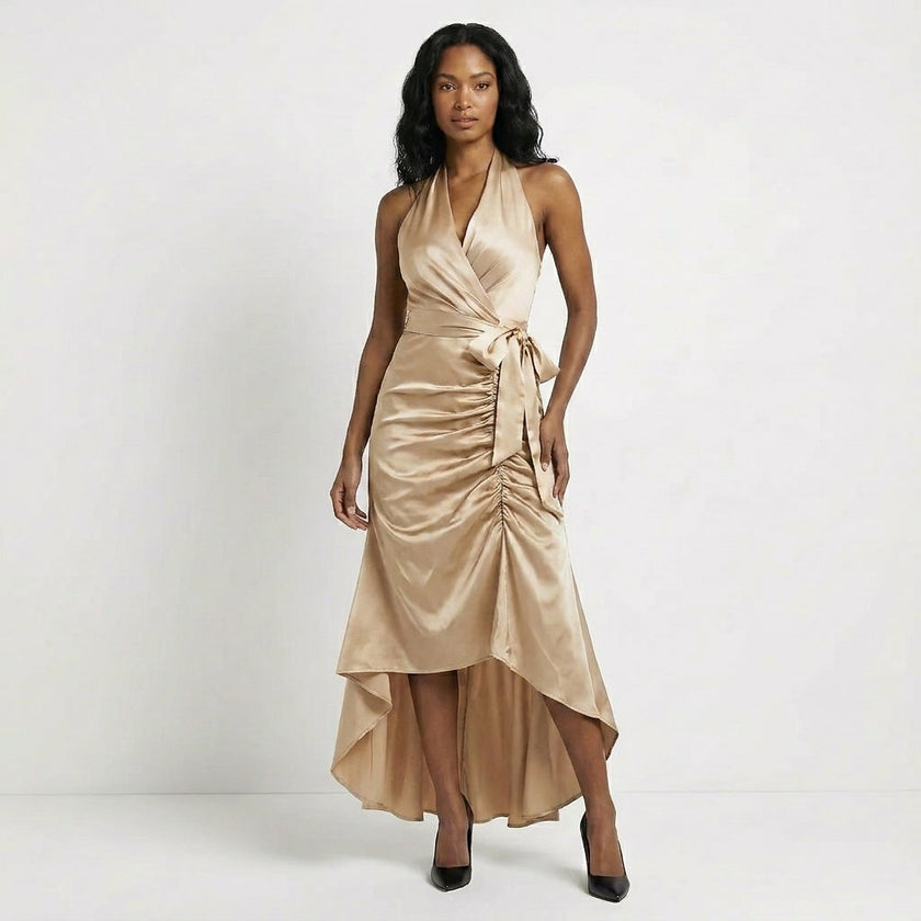 FJØRNA elegant champagne satin maxi dress for women with halter neckline and ruffle detail, perfect for formal occasions.