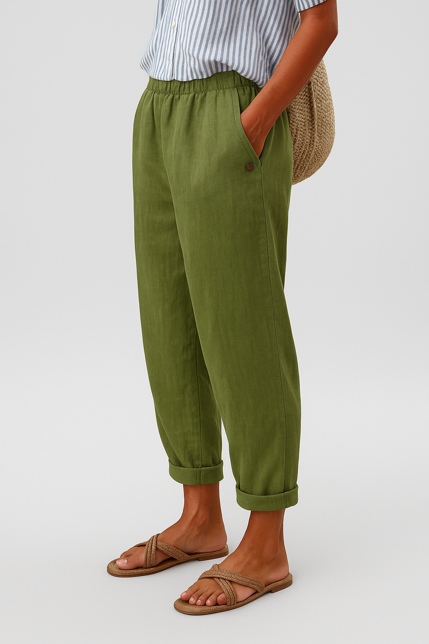 FJØRNA women's lightweight summer trousers with straight legs, breathable fabric, and side pockets, ideal for casual wear.