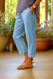 Lightweight summer women's trousers by FJØRNA with straight-leg fit and front pockets, perfect for casual warm-weather wear.