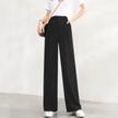 FJØRNA women's lightweight summer trousers with wide leg, high waist, and button front, perfect for warm-weather styling.