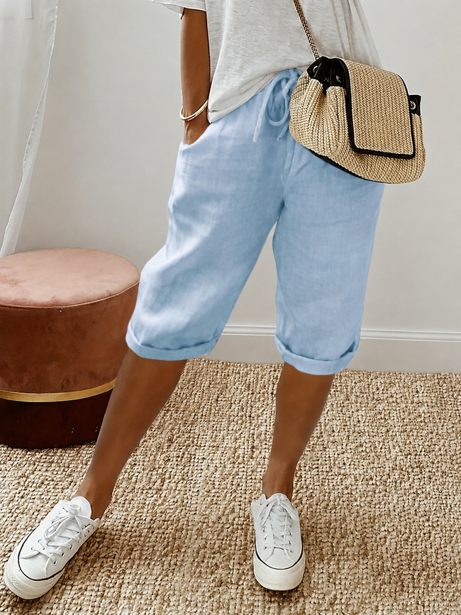 FJØRNA women's lightweight summer capri pants with drawstring elastic waist and relaxed fit, ideal for warm weather and casual wear.