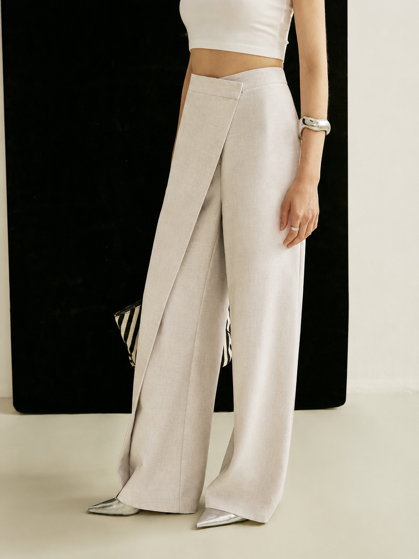 FJØRNA women's lightweight summer trousers with wide legs and high waist, featuring a wrap design and relaxed fit.