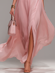 FJØRNA chiffon halter neck maxi dress with comfortable fit, ideal for evening occasions, flowing fabric and elegant design.