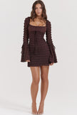 FJØRNA coffee ruched mini dress for women, stylish party and day dress, shown on a model with a fitted silhouette and ruched details.