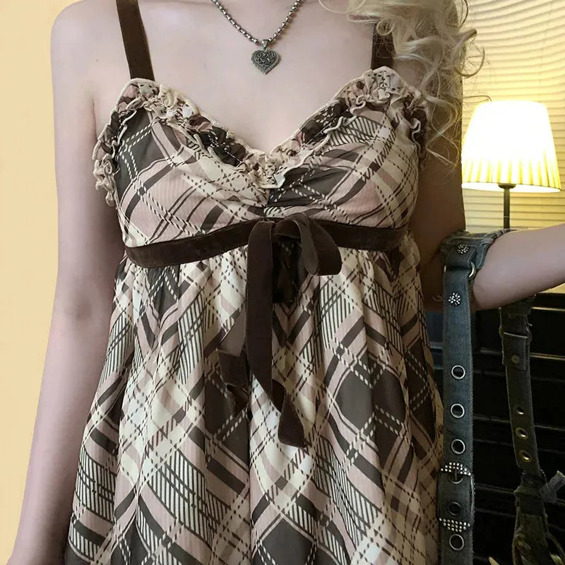 FJØRNA Coquette plaid mini dress for women, featuring a stylish plaid pattern, perfect for party or daytime wear.