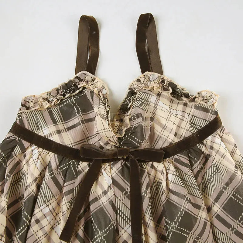 FJØRNA Coquette plaid women's mini dress featuring a stylish, fitted silhouette perfect for party and daytime wear.