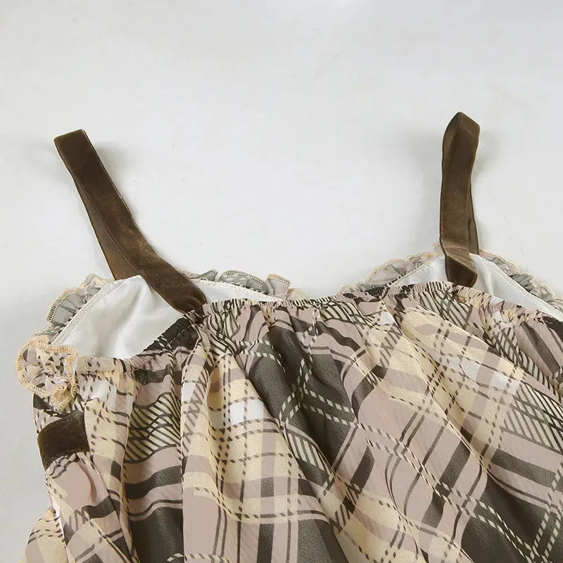 FJØRNA Coquette plaid mini dress for women, featuring a stylish party and day wear design with a fitted silhouette and plaid pattern.