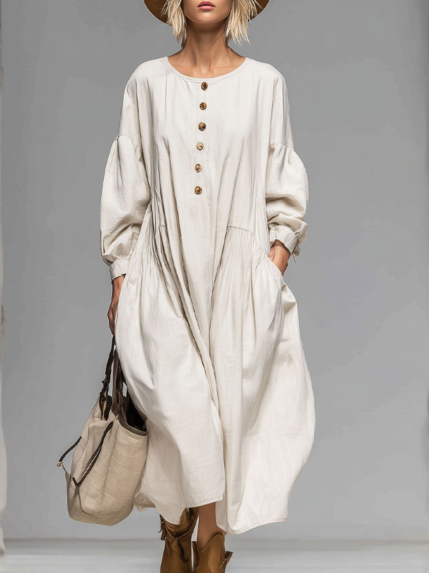 Cotton button-front midi dress for women by FJØRNA, featuring a relaxed fit and classic collar in soft cotton fabric.