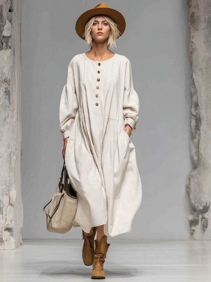 FJØRNA cotton button-front midi dress for women, featuring a relaxed fit with a classic collar and button details.