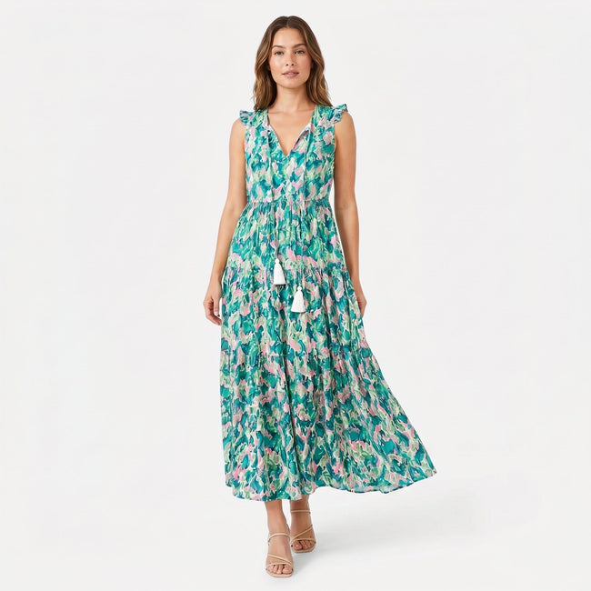 Women's sleeveless floral print tie neck boho maxi dress by FJØRNA, featuring a flowy silhouette and vibrant floral pattern.