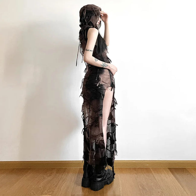 FJØRNA distressed sheer women's maxi dress with a flowing design, perfect for summer and special occasions.