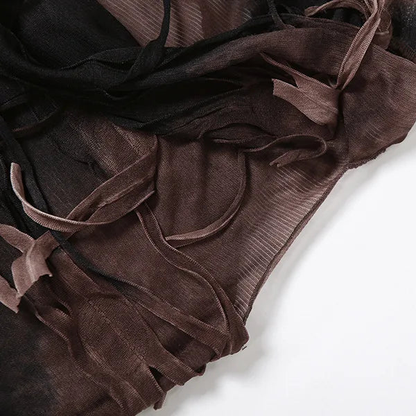FJØRNA distressed sheer women's maxi dress, lightweight and flowy for summer and special occasions, shown hanging on a rack.