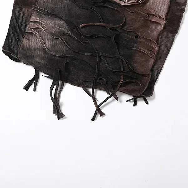 FJØRNA distressed sheer women's maxi dress with a flowing silhouette, perfect for summer and special occasions.