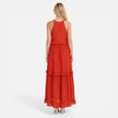 Lightweight women's tiered maxi dress by FJØRNA with a flowy summer design and halter neck, perfect for warm weather.