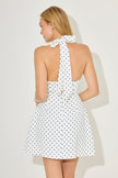 FJØRNA white mini dress with polka dot pattern, stylish volume skirt, perfect for party and day wear.