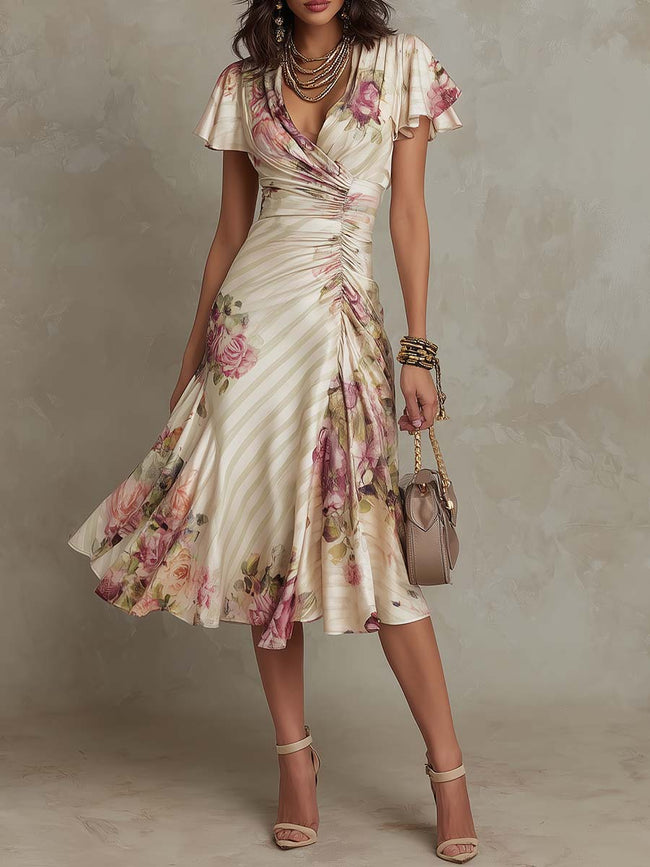 Elegant vintage floral satin midi dress for women by FJØRNA, featuring a flowing chiffon fabric and classic day-to-night style.