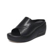 FJØRNA women's orthopedic slip-on shoes with wedge heels, featuring supportive design and comfortable fit for everyday wear.