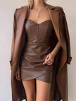 FJØRNA faux leather corset mini dress for women, stylish party and cocktail dress with fitted design and sleek leather look.