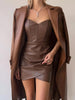 FJØRNA faux leather corset mini dress for women, stylish party and cocktail dress with fitted design and sleek leather look.