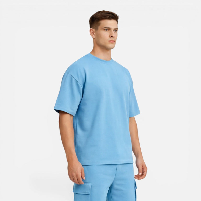Men's casual summer set by FJØRNA with matching T-shirt and cargo shorts, perfect for relaxed warm-weather wear.