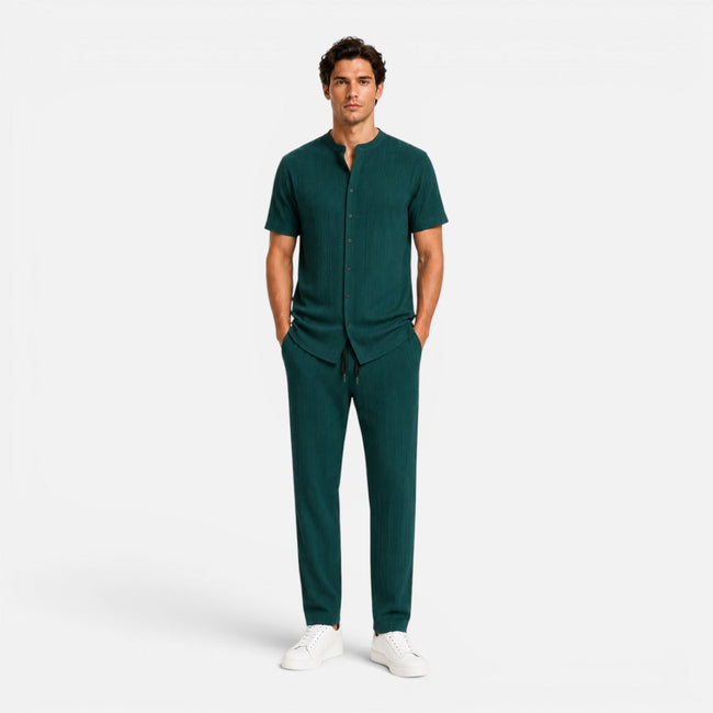 Men's summer matching set by FJØRNA featuring a lightweight shirt and trousers, perfect for warm weather casual wear.
