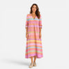 FJØRNA women's striped maxi dress featuring a flowing silhouette and bold horizontal stripe pattern on lightweight fabric.