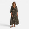 Women's flowy maxi dress with abstract print by FJØRNA, featuring a relaxed fit and stylish design perfect for casual or special occasions.