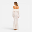Women's off-shoulder lace maxi dress with flare sleeves by FJØRNA, featuring intricate lace details and flowing silhouette.