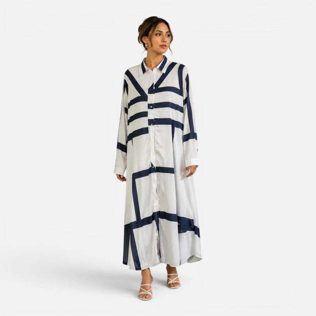 Women's oversized maxi dress by FJØRNA featuring a geometric print and loose fit, perfect for a stylish, relaxed look.