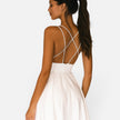 FJØRNA women's wedding guest midi dress with flowing waist cut, elegant design, and soft fabric, perfect for special occasions.