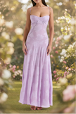 White floral lace-up maxi dress by FJØRNA, flowing design with delicate lace details and a stylish silhouette.