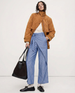 Women's high-waist cotton wide-leg trousers by FJØRNA, featuring a loose pull-on design and relaxed fit.