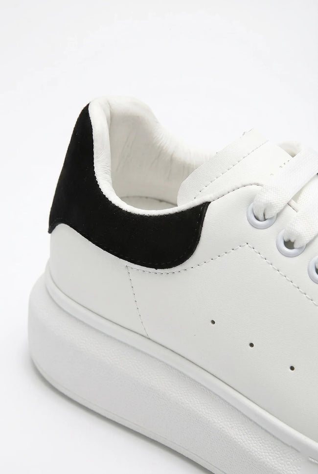 White FJØRNA men's lace-up trainers with minimalist design, ideal for everyday casual style, shown in a clean, modern shoe image.