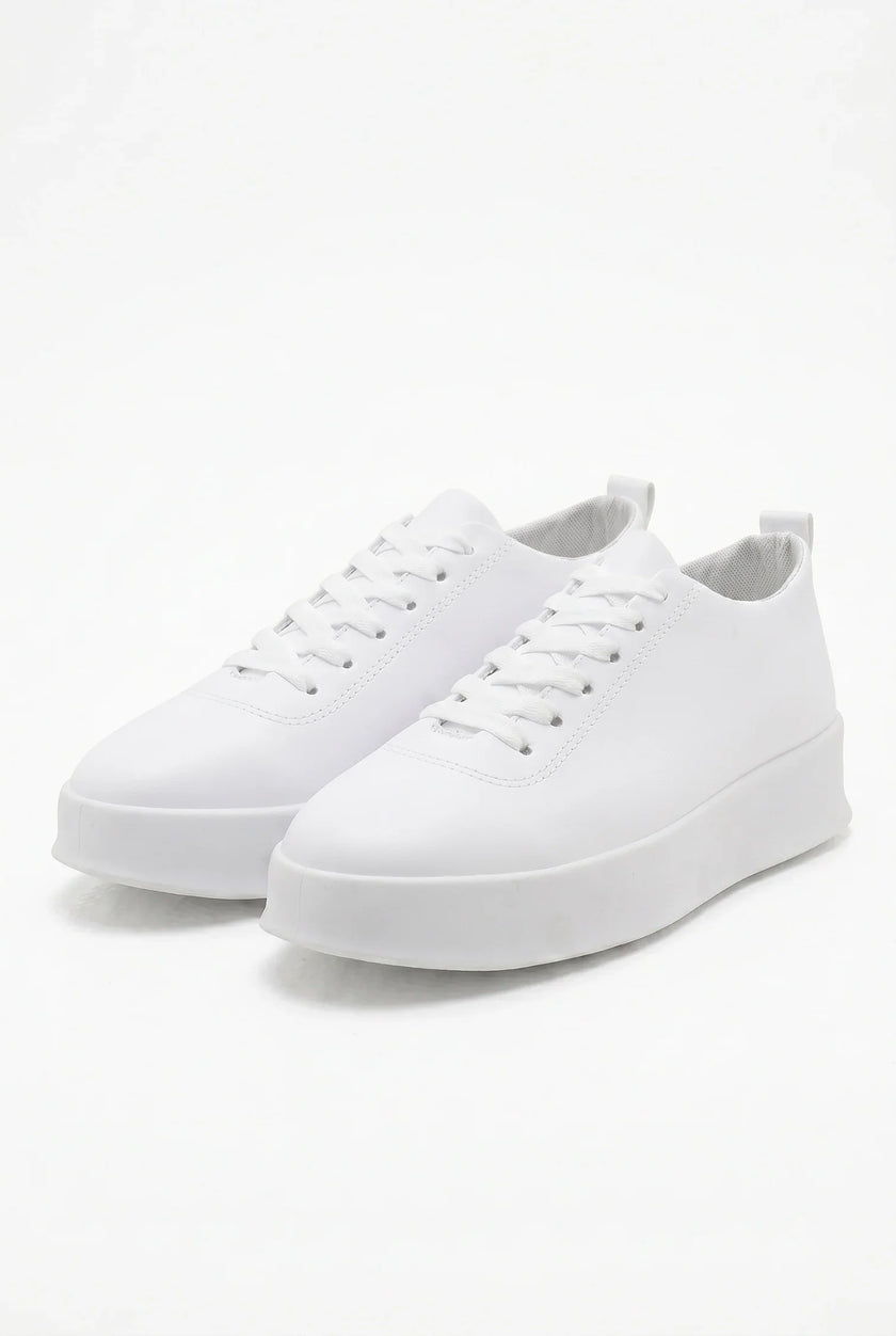 White FJØRNA men's slip-on trainers with a clean, minimalist design, perfect for casual and everyday wear.