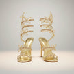 FJØRNA women's butterfly rhinestone wrap stiletto sandals with butterfly heel design, featuring sparkling rhinestones and elegant straps.