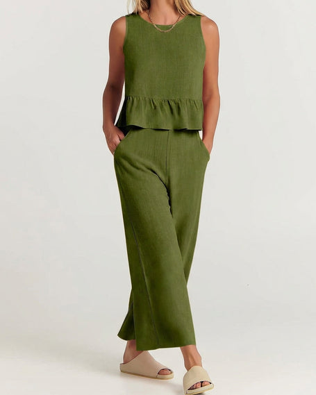 Elegant women's linen two-piece ruffle co-ord set by FJØRNA, featuring a stylish top and matching skirt with ruffle details.