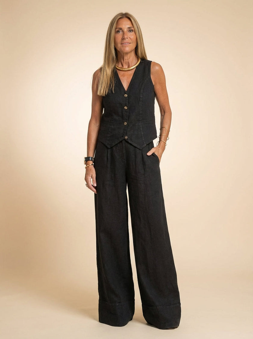 FJØRNA women's summer two-piece linen co-ord set with button-front top and matching shorts, casual and breathable for warm weather.