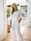 FJØRNA women's summer two-piece linen co-ord set with pockets, featuring a stylish and breathable matching top and shorts.
