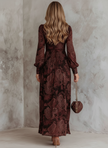 FJØRNA retro zipper neck long sleeve paisley print women's midi dress displayed on a model, showcasing vintage-inspired style and pattern.